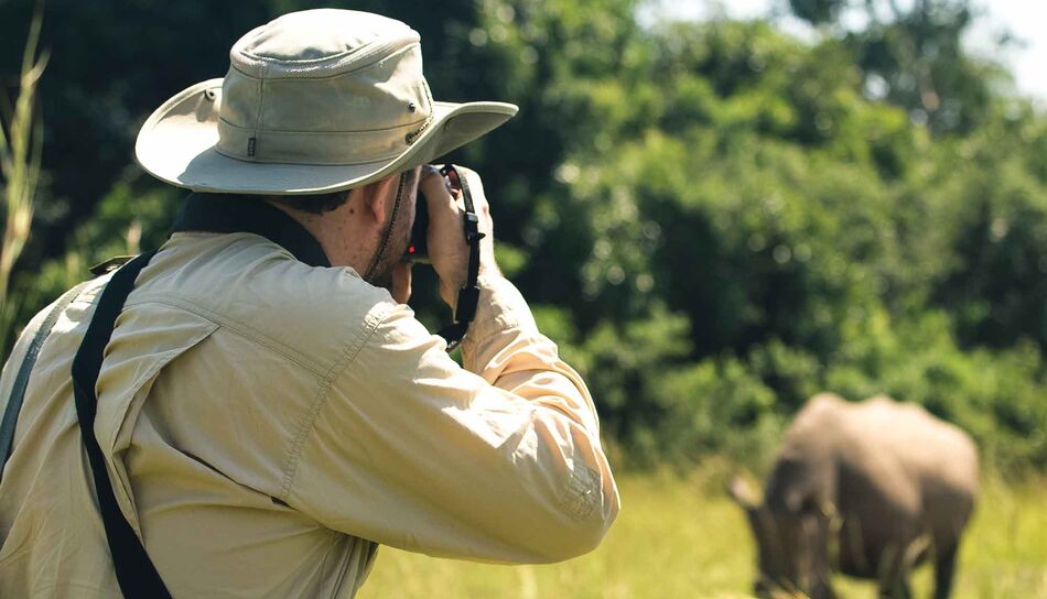 Fotograf in Uganda auf der Ziwa Rhino and Wildlife Ranch