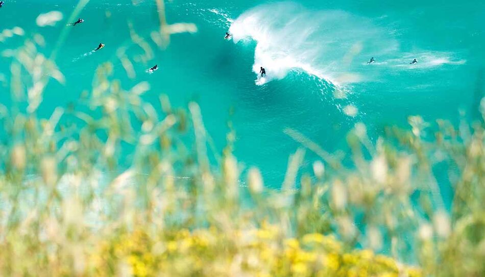 Surfer in Noordhoek bei Kapstadt, Südafrika