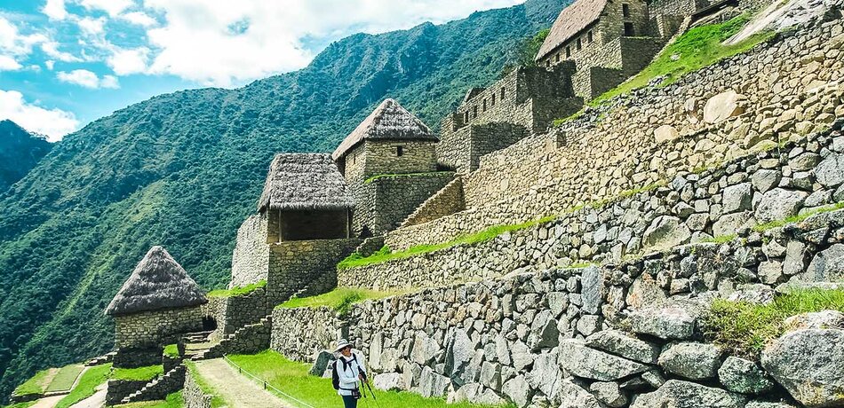 Besucher in der Inka-Stadt Machu Picchu